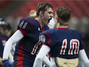Vernon's Bradley Hladik, who scored two touchdowns in his Panthers' win over Hugh Boyd, celebrates a berth in the Subway Bowl final Saturday at B.C. Place.