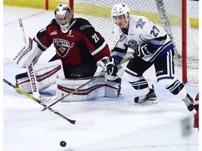 Goaltender Ryan Kubic of the Vancouver Giants, making a save against Jared Dmitriw of the Victoria Royals last month, has been a bright light for the WHL squad.
