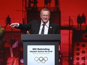 IOC Vice President John Coates delivers a speech during the closing plenary session of the IOC Debriefing of the Olympic Games Rio 2016, in Tokyo, Wednesday, Nov. 30, 2016. The three-day IOC debriefing ends Wednesday to share knowledge and experiences between the Rio Olympic Games organizers and future host cities, including Tokyo which will host the 2020 Olympics and Paralympics. (AP Photo/Eugene Hoshiko)