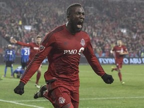 Toronto FC forward Jozy Altidore celebrates scoring his team&#039;s second goal against the Montreal Impact during first half Eastern Conference final MLS action in Toronto on Wednesday November 30, 2016. The burly U.S. international forward has had to deal with high expectations and plenty of finger-pointing since he turned pro at 16. THE CANADIAN PRESS/Chris Young