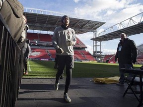 Toronto FC goalkeeper Clint Irwin heads to the locker room after speaking to the media following a training session, in Toronto on Friday, December 9, 2016, ahead of tomorrow&#039;s MLS Cup final against the Seattle Sounders. THE CANADIAN PRESS/Chris Young