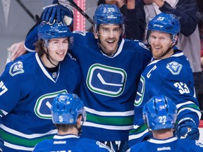 Vancouver Canucks' Brandon Sutter, centre, might just be the nicest guy in the locker-room, but the team could use some of the snarl that his family is famous for.