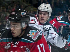 Vancouver Giants captain Tyler Benson, right, was pulled from the lineup Wednesday due to an injury.