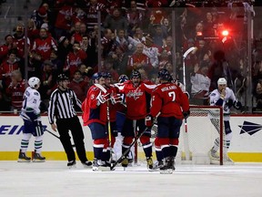 The Washington Capitals celebrate in their favourite spot -- directly in front of the Canucks' goal.