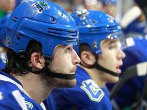 Erik Gudbranson #44 of the Vancouver Canucks looks on from the bench during their NHL game against the Toronto Maple Leafs at Rogers Arena December 3, 2016 in Vancouver, British Columbia, Canada.