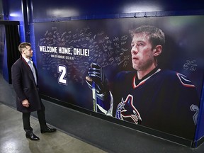 Former vancouver Canucks and Tampa Bay Lightning player Mattias Ohlund, walks by a life-size mural before the NHL game between the Vancouver Canucks and the Tampa Bay Lightning at Rogers Arena December 16, 2016 in Vancouver, British Columbia, Canada. Ohlund will be inducted into the  Rogers Arena Ring of Honour before the NHL game between the Lightning and the Canucks today.