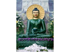 Jade Buddha for Universal Peace, carved from the 'Polar Pride,' an 18-ton, gem-quality boulder from Green Mountain Jade's Polar mine in B.C.