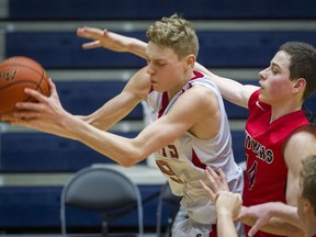 St. Thomas More Knights Cam Morris, left, is working to improve his leadership this season with B.C.'s No. 3-ranked, triple-A basketball team.