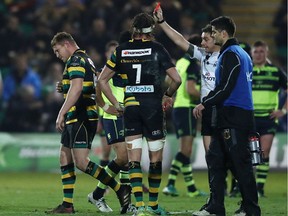 NORTHAMPTON, ENGLAND - DECEMBER 09: Dylan Hartley of Northampton walks off the pitch after being shown the red card by referee Jerome Garces during the European Rugby Champions Cup match between Northampton Saints and Leinster at Franklin's Gardens on December 9, 2016 in Northampton, United Kingdom.