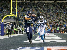 Tight end Jimmy Graham scores a touchdown against the Panthers.