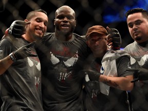 LOS ANGELES, CA - FEBRUARY 28:  Derrick Lewis celebrates his win over Ruan Potts in their heavyweight bout during the UFC 184 event at Staples Center on February 28, 2015 in Los Angeles, California.  (Photo by Harry How/Getty Images)