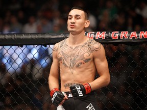 LAS VEGAS, NV - DECEMBER 12:  Max Holloway waits for the start of his featherweight fight against Jeremy Stephens during UFC 194 at MGM Grand Garden Arena on December  12, 2015 in Las Vegas, Nevada.  (Photo by Steve Marcus/Getty Images)