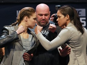 Women's Bantamweight Champion Amanda Nunes faces off with Ronda Rousey after UFC 205 Weigh-ins in preparation for their UFC 207 fight that will take place on December 30, 2016 at Madison Square Garden on November 11, 2016 in New York City. (Michael Reaves/Getty Images)