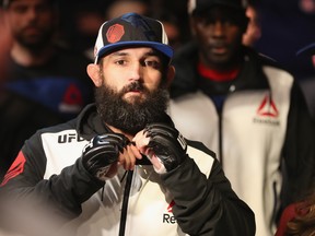 LAS VEGAS, NV - DECEMBER 30:  Johny Hendricks walks to the Octagon to face Neil Magny in their welterweight bout during the UFC 207 event at T-Mobile Arena on December 30, 2016 in Las Vegas, Nevada.  (Photo by Christian Petersen/Getty Images)