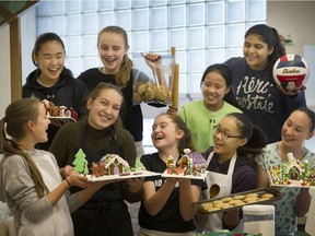 Sasha Meshcherekova (front, second from left) of Vancouver's Sir Winston Churchill Secondary is all smiles after teaching a baking class at her school.