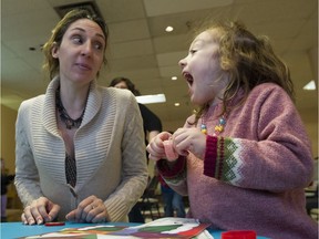Adele Crosby plays with her daughter Pearl, 4, at a Westcoast Family Centres Society open house in Vancouver. The organization is supported by The Province's Empty Stocking Fund.