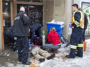The Vancouver Fire Department Medical Unit responds to an unresponsive drug addict in the Downtown Eastside.