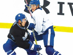 William Nylander gets around Frank Corrado during Leafs practice at the Mastercard Centre in Toronto on Wednesday November 9, 2016. Dave Abel/Toronto Sun/Postmedia Network ORG XMIT: POS1611091324305324 ORG XMIT: POS1611101812070288