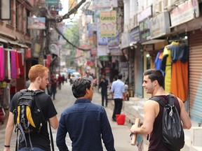 Thomas Jamieson and friends Stu Coulson and Jeremy Renke explore the Thamel district in Kathmandu that features narrow alleyways crowed with shops and restaurants