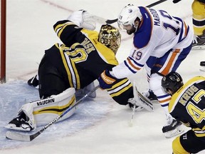 Edmonton Oilers left wing Patrick Maroon (19) scores past Boston Bruins goalie Tuukka Rask (40) in the third period of an NHL hockey game, Thursday, Jan. 5, 2017, in Boston. It was Maroon&#039;s third goal of the game. (AP Photo/Elise Amendola)