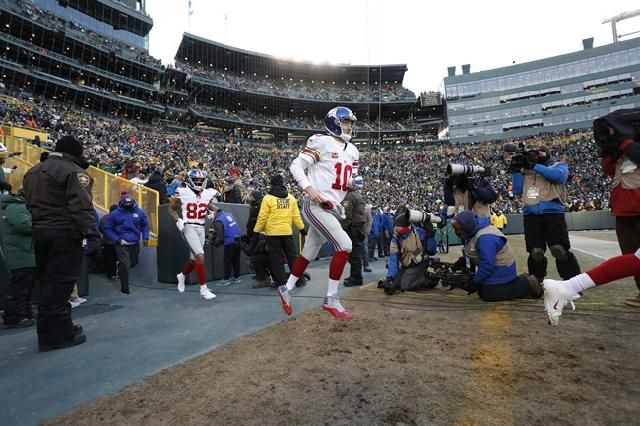 Rodgers, Packers make magic happen in 38-13 playoff win (updated