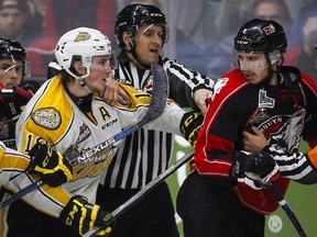 Brandon Wheat Kings&#039; Nolan Patrick, left, and Rouyn-Noranda Huskies&#039; Anthony-John Greer are separated as they scuffle during third period CHL Memorial Cup hockey action in Red Deer, Saturday, May 21, 2016. Patrick was named the top North American draft-eligible skater for the 2017 Draft by the NHL Central Scouting Bureau on Wednesday.THE CANADIAN PRESS/Jeff McIntosh