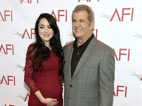 FILE - This Jan. 6, 2017 file photo shows Rosalind Ross, left, and Mel Gibson at the AFI Awards at the Four Seasons Hotel in Los Angeles. Gibson‚Äôs publicist Alan Nierob confirms actor-director Rosalind Ross gave birth to their son, Lars Gerard Gibson, on Friday, Jan. 20. Gibson, who won an Oscar for directing &ampquot;Braveheart,&ampquot; has seven children from his marriage to his ex-wife, Robyn Moore. Their youngest child is 17. He also had a 7-year-old daughter with ex-girlfriend Oksana Grigorieva. (Photo