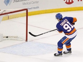 John Tavares&#039; first Olympics proved to be &ampquot;bittersweet.&ampquot; Though he ultimately captured gold with Team Canada in 2014, Tavares didn&#039;t get to play in the gold medal game against Sweden because of a knee injury. Tavares (91) scores an open net goal during third period NHL hockey action against the Los Angeles Kings, in New York on Saturday, Jan. 21, 2017. THE CANADIAN PRESS/AP-Julie Jacobson