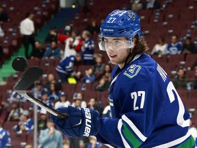 Ben Hutton suffered a fracture in his hand vs. Calgary on Jan. 6, the Canucks have confirmed.