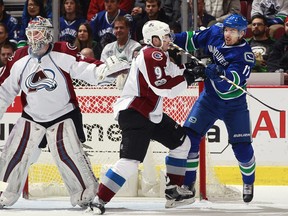 Anton Rodin, right, played his second Canucks game on Monday versus the Avalanche.