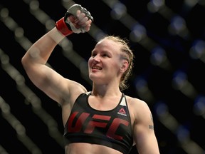 Valentina Shevchenko of Kyrgyzstan celebrates her win over Julianna Penna in the women's Bantamweight division during the UFC Fight Night at the Pepsi Center.