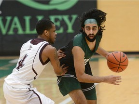 Fraser Valley point guard Manny Dulay (right) is leading the nation in made three-pointers for the Cascades. Dan Kinvig/UFV athletics