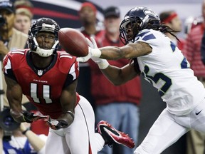 A big head-to-head matchup to relish: Atlanta Falcons wide receiver Julio Jones (left) takes on Seattle Seahawks cornerback Richard Sherman.