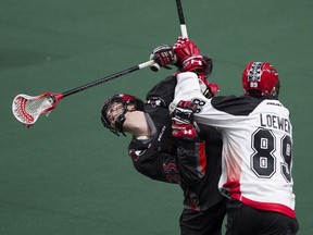 Riley Loewen of the Calgary Roughnecks earned an elbowing penalty for this collision with Thomas Hoggarth of the Vancouver Stealth in Calgary's 14-10 road win on Jan. 14. The teams are back at it once more on Saturday in Calgary.