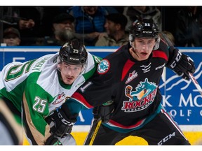 Forward Jordan Borstmayer, then with the Kelowna Rockets, battles for position with Sean Montgomery of the Prince Albert Raiders. Borstmayer, dealt to the Vancouver GIants, looks to add some depth and offence to the WHL squad.
