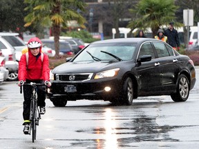 Diana Pham became a regular bike commuter to work in Richmond after taking a seminar on riding in the rain.