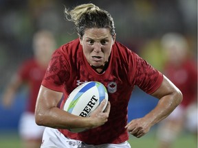 Canada's Kelly Russell scores a try in the womens rugby sevens bronze medal match between Canada and Britain during the Rio 2016 Olympic Games at Deodoro Stadium in Rio de Janeiro on August 8, 2016./