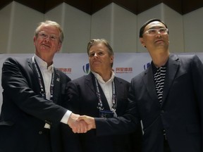 Bernard Lapasset, chairman of World Rugby, Brett Gosper, CEO of World Rugby and Dazhong Zhang of Alisports after signing a development partnership agreement in April, 2016.