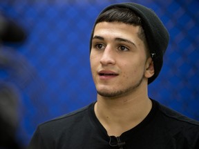 MILWAUKEE, WI - JANUARY 16:  Sergio Pettis takes an interview during Media Day at Roufusport Mixed Martial Arts Academy on January 16, 2014 in Milwaukee, Wisconsin. (Photo by Mike McGinnis/Getty Images)