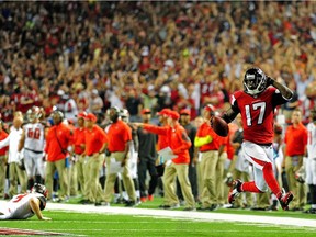 Devin Hester returns a punt for the Falcons for a touchdown against the Tampa Bay Buccaneers in 2014.