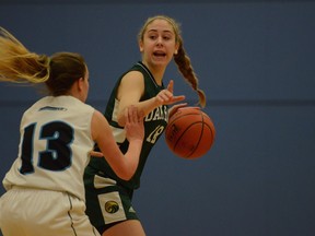 Oak Bay point guard Bego de Santiago (right) is guarded by Seycove's Kayla Krug during semifinal action Friday evening in Coquitlam. (Howard Tsumura photo)