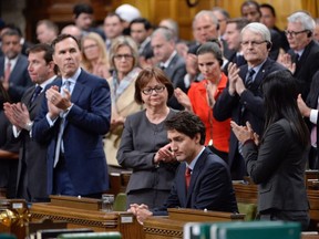 Prime Minister Justin Trudeau receives applause after commenting on the Quebec City mosque shootings in the House of Commons on Parliament Hill in Ottawa on Monday, Jan. 30, 2017.