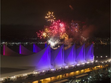 Fireworks explode over Canada Place at Concord's New Year's Eve Vancouver Celebration, held at Canada Place on Dec. 31, 2016.