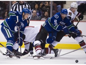 Bo Horvat and Sven Baertschi get mixed up with Martin Hanzal and Connor Murphy in the Canucks' 3-0 win over the Coyotes.