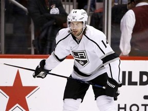 FILE - In this Sept. 26, 2016, file photo, Los Angeles Kings&#039; Tom Gilbert (14) pauses on the ice during the first period of a preseason NHL hockey game against the Arizona Coyotes, in Glendale, Ariz. The Washington Capitals have acquired defenseman Tom Gilbert from the Los Angeles Kings for future considerations. Capitals general manager Brian MacLellan announced the deal Wednesday, Feb. 15, 2017, with the team on its bye week. (AP Photo/Ross D. Franklin, File)