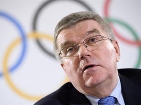 FILE - In this Thursday, Dec. 8, 2016 file photo, International Olympic Committee (IOC) president Thomas Bach, from Germany speaks during a press conference after the executive board meeting of the International Olympic Committee, in Lausanne, Switzerland. Bach welcomes talk that two Summer Games hosts could be picked in September. (Laurent Gillieron/Keystone via AP, File)