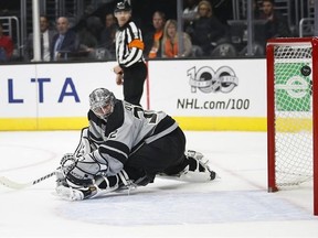 The puck hit by Anaheim Ducks&#039; Andrew Cogliano enters the net past Los Angeles Kings goalie Jonathan Quick for a goal during the first period of an NHL hockey game Saturday, Feb. 25, 2017, in Los Angeles.(AP Photo/Jae C. Hong)