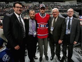 (L-R) Scout Ryan Jankowski, scout Trevor Timmons, Tim Bozon, drafted 64th overall by the Montreal Canadiens, scout Elmer Benning and scout Alvin Backus during day two of the 2012 NHL Entry Draft.