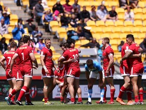 Canadian players celebrate the win in the Cup Quarter Final match between Canada and Argentina during the 2017 Wellington Sevens.