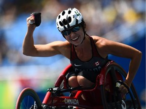 Michelle Stilwell of Canada celebrates after winning the 100M T52 wheelchair race at the Paralympic Games in Rio de Janeiro, Brazil on September 17, 2016. /